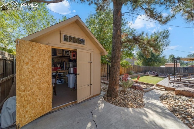 1065 N 19th St, Colorado Springs, CO 80904 - view of shed featuring a fenced backyard