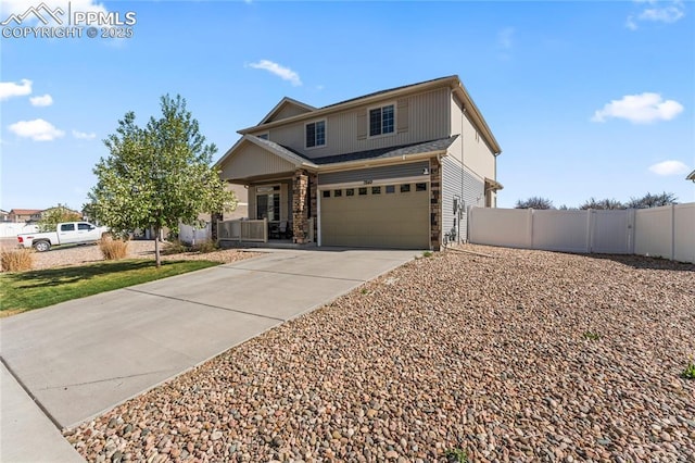 view of front of house featuring fence, covered porch, stone siding, concrete driveway, and an attached garage