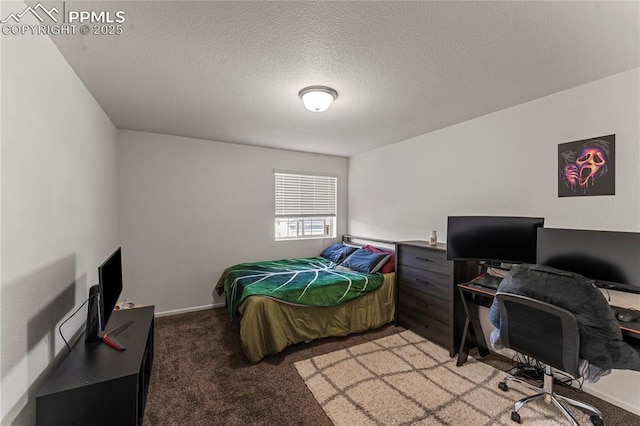 bedroom with a textured ceiling and light colored carpet