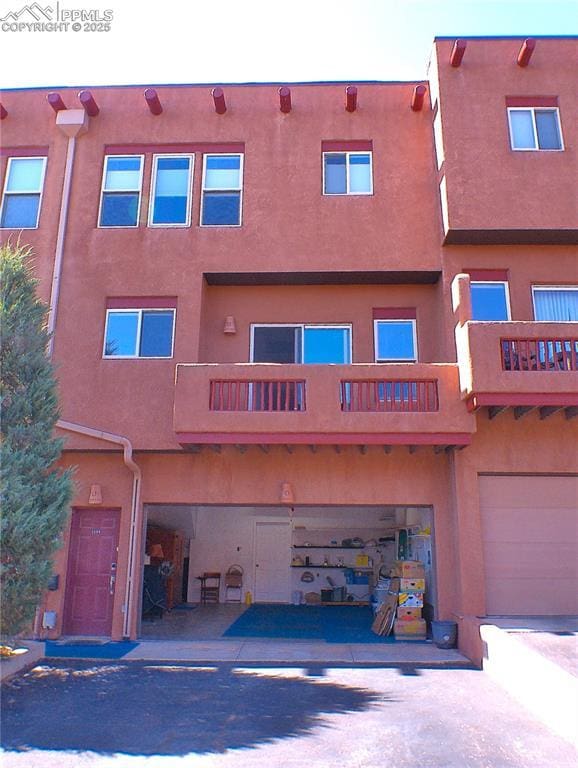 view of property featuring a garage