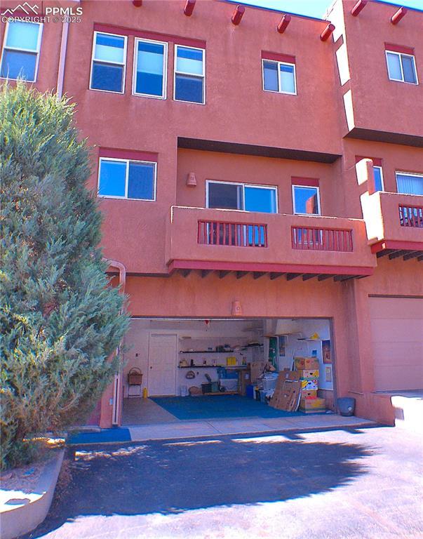 view of property featuring a garage