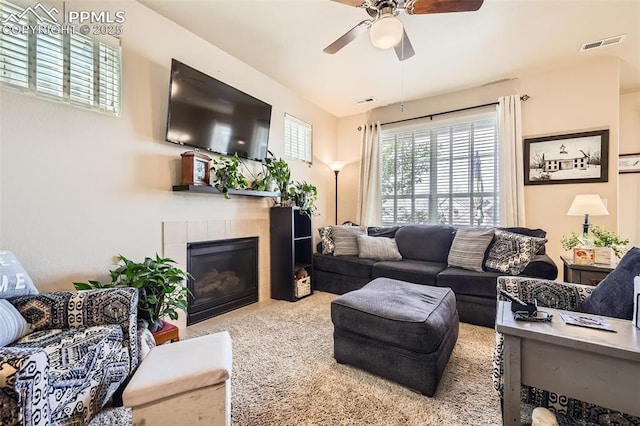 4338 Alder Springs Vw, Colorado Springs, CO 80922 - living room featuring ceiling fan and a tile fireplace