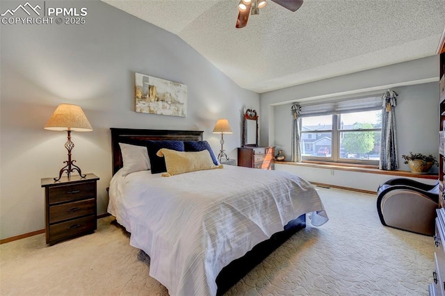620 Coveglen Ct, Colorado Springs, CO 80906 - bedroom with ceiling fan, light carpet, a textured ceiling, baseboards, and vaulted ceiling