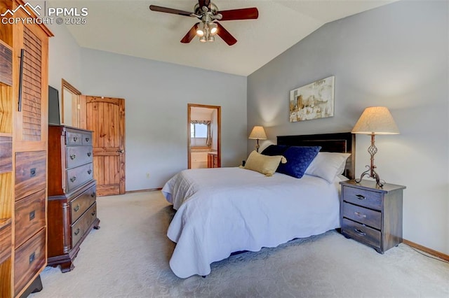 620 Coveglen Ct, Colorado Springs, CO 80906 - bedroom with baseboards, ensuite bathroom, lofted ceiling, and light carpet