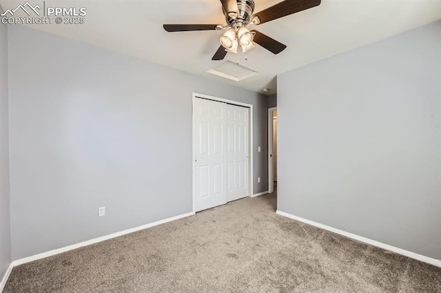 7824 Bengali Ln, Colorado Springs, CO 80923 - unfurnished bedroom with carpet floors, a closet, baseboards, attic access, and a ceiling fan