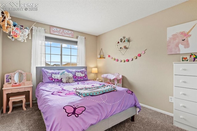 carpeted bedroom featuring baseboards and a textured ceiling