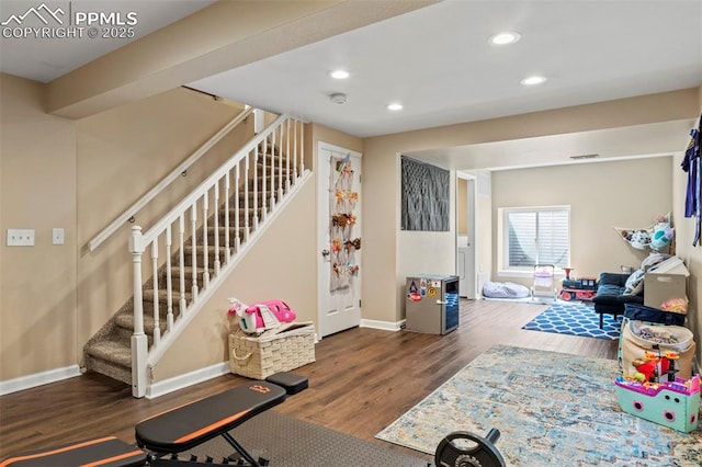 recreation room featuring wood finished floors, baseboards, and recessed lighting