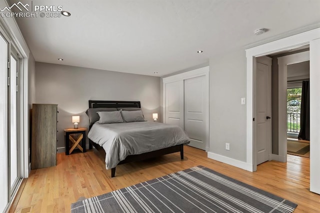 15 Newport Cir, Colorado Springs, CO 80906 - bedroom with light wood-style floors, baseboards, a closet, and recessed lighting