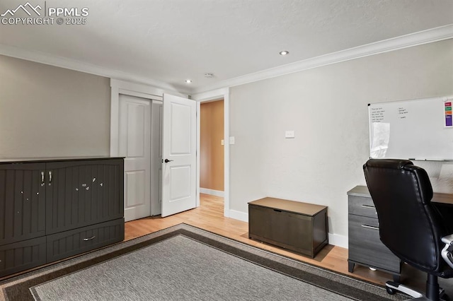 15 Newport Cir, Colorado Springs, CO 80906 - office area featuring baseboards, ornamental molding, recessed lighting, and wood finished floors