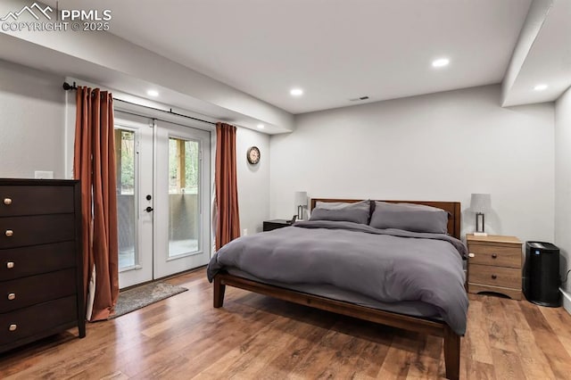 15 Newport Cir, Colorado Springs, CO 80906 - bedroom with recessed lighting, access to outside, and light wood-type flooring
