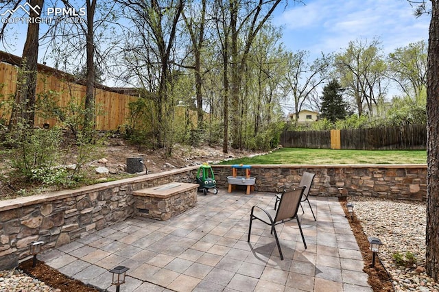 15 Newport Cir, Colorado Springs, CO 80906 - view of patio with a fenced backyard