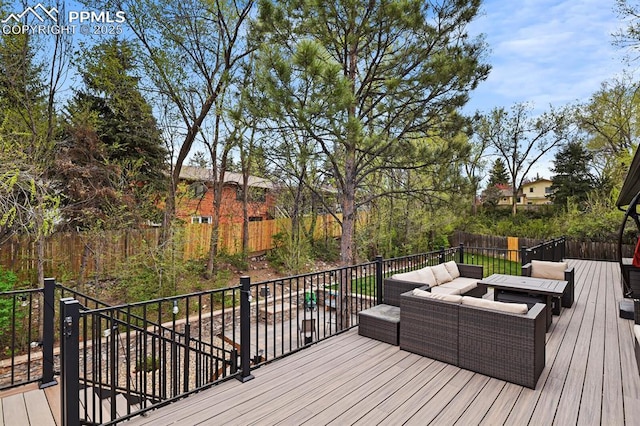 15 Newport Cir, Colorado Springs, CO 80906 - wooden terrace featuring a fenced backyard and outdoor lounge area