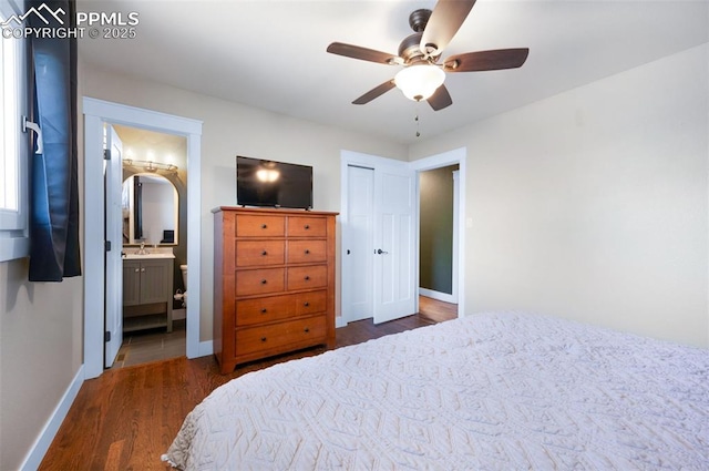208 Davie Dr, Colorado Springs, CO 80911 - bedroom with baseboards, ceiling fan, ensuite bathroom, and wood finished floors