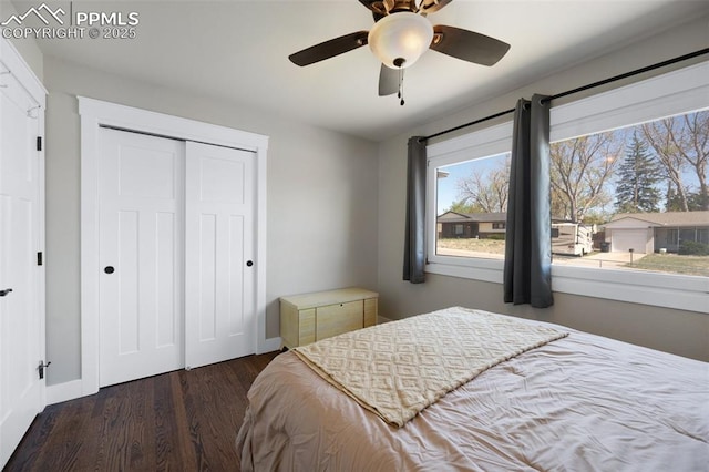 208 Davie Dr, Colorado Springs, CO 80911 - bedroom featuring a closet, a ceiling fan, baseboards, and wood finished floors