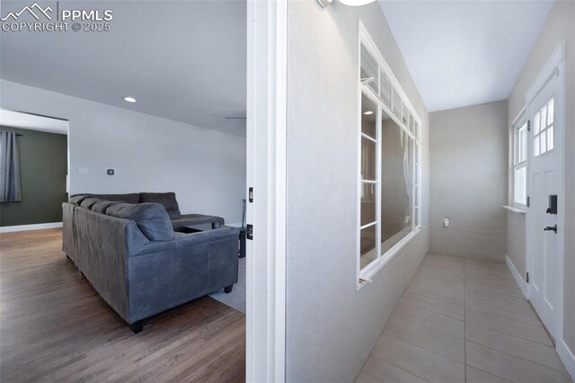 208 Davie Dr, Colorado Springs, CO 80911 - hall featuring tile patterned floors, baseboards, and recessed lighting