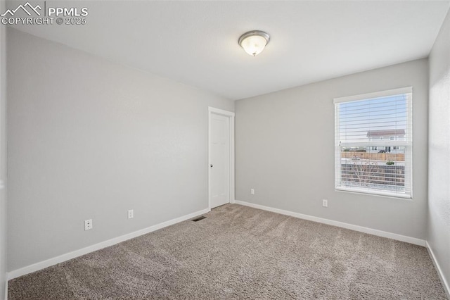 7318 Dutch Loop, Colorado Springs, CO 80925 - unfurnished room with visible vents, carpet flooring, and baseboards