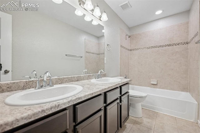 7318 Dutch Loop, Colorado Springs, CO 80925 - full bath featuring a sink, tile patterned floors, toilet, and visible vents