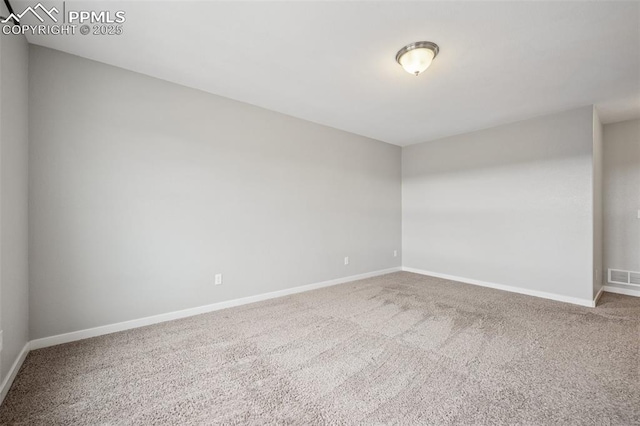 7318 Dutch Loop, Colorado Springs, CO 80925 - spare room featuring baseboards, visible vents, and carpet