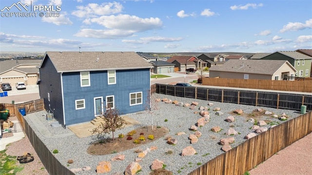 7318 Dutch Loop, Colorado Springs, CO 80925 - exterior space featuring a patio, a residential view, and a fenced backyard