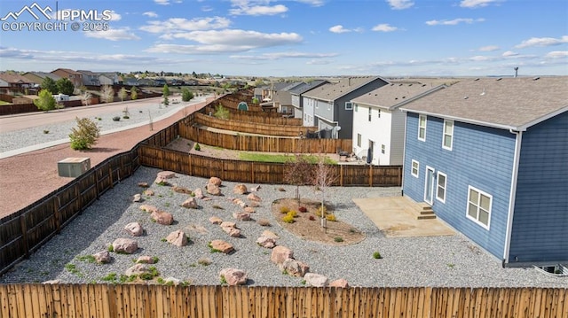 7318 Dutch Loop, Colorado Springs, CO 80925 - exterior space with a residential view, a fenced backyard, and a patio area