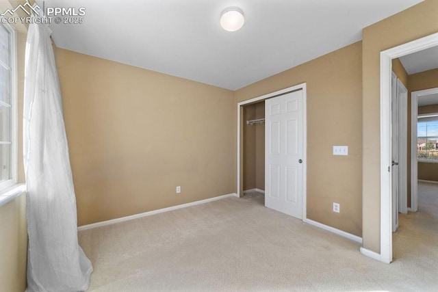 9089 Royal Melbourne Cir, Peyton, CO 80831 - unfurnished bedroom with baseboards, carpet, and a closet