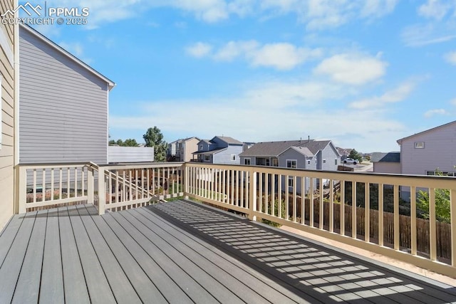 9089 Royal Melbourne Cir, Peyton, CO 80831 - wooden deck with a residential view