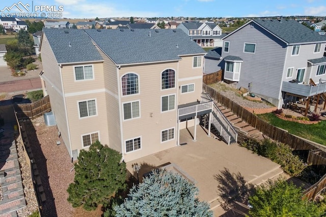 9089 Royal Melbourne Cir, Peyton, CO 80831 - view of building exterior featuring a fenced backyard and a residential view
