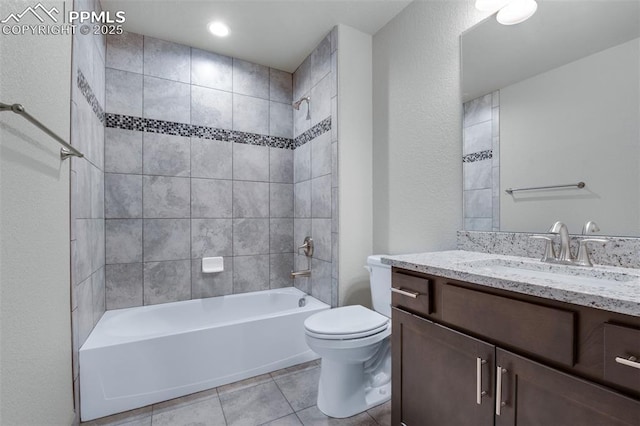 full bath with vanity, tile patterned floors, toilet, and shower / washtub combination