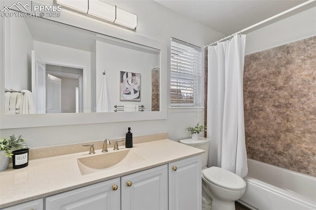 bathroom with toilet, vanity, and shower / bathtub combination with curtain