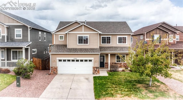 craftsman-style house with concrete driveway, roof with shingles, fence, and stone siding