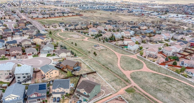 birds eye view of property with a residential view