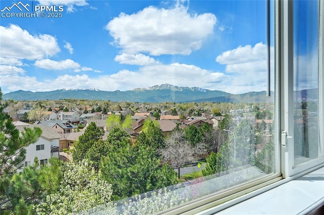 property view of mountains with a residential view
