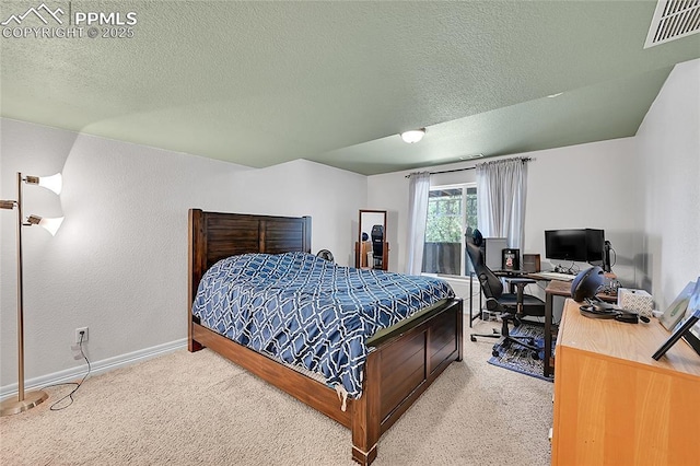 bedroom featuring baseboards, carpet, a textured ceiling, and visible vents