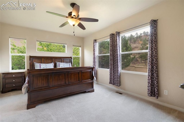 2532 Sierra Oak Dr, Colorado Springs, CO 80919 - bedroom featuring baseboards, visible vents, light carpet, and ceiling fan
