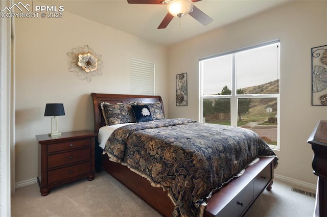 2532 Sierra Oak Dr, Colorado Springs, CO 80919 - bedroom with baseboards, visible vents, light carpet, and ceiling fan