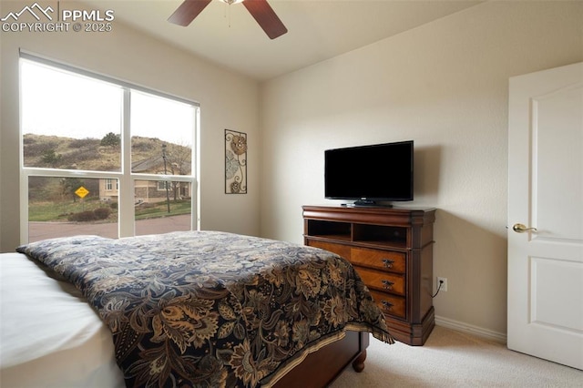 2532 Sierra Oak Dr, Colorado Springs, CO 80919 - bedroom featuring light colored carpet, a ceiling fan, and baseboards