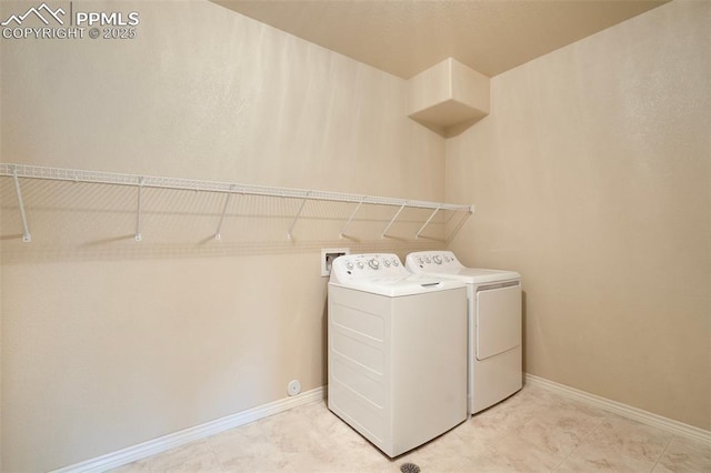 2532 Sierra Oak Dr, Colorado Springs, CO 80919 - washroom with baseboards, laundry area, and independent washer and dryer