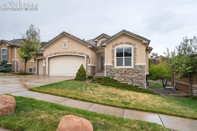 2532 Sierra Oak Dr, Colorado Springs, CO 80919 - view of front of house with a front yard, concrete driveway, an attached garage, stone siding, and stucco siding