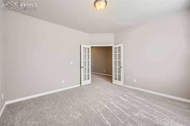 8094 Misty Moon Dr, Colorado Springs, CO 80924 - carpeted spare room with french doors and baseboards