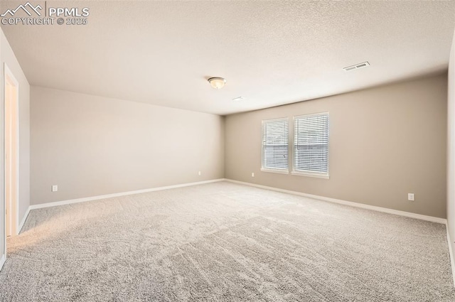 8094 Misty Moon Dr, Colorado Springs, CO 80924 - unfurnished room with baseboards, visible vents, and carpet
