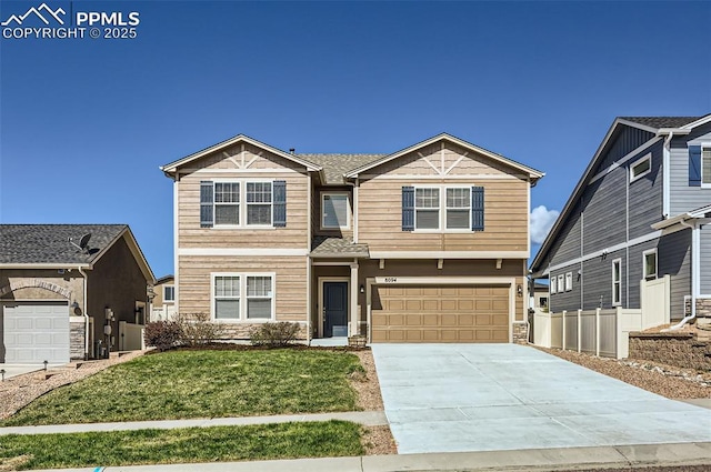 8094 Misty Moon Dr, Colorado Springs, CO 80924 - craftsman inspired home with a garage, fence, stone siding, a front yard, and concrete driveway