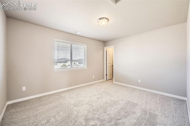 8094 Misty Moon Dr, Colorado Springs, CO 80924 - unfurnished room featuring baseboards, carpet, and visible vents