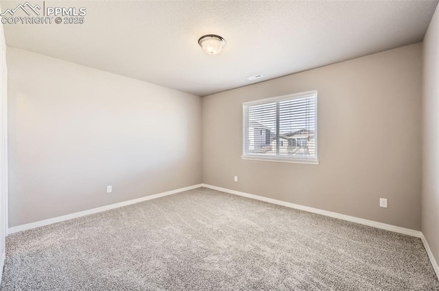 8094 Misty Moon Dr, Colorado Springs, CO 80924 - spare room featuring carpet floors and baseboards