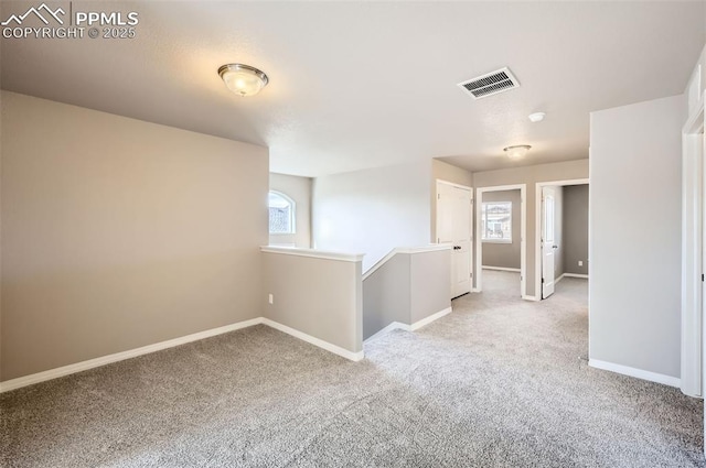 8094 Misty Moon Dr, Colorado Springs, CO 80924 - carpeted spare room with baseboards and visible vents