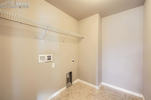 8094 Misty Moon Dr, Colorado Springs, CO 80924 - laundry area featuring hookup for an electric dryer, laundry area, light tile patterned floors, baseboards, and hookup for a washing machine