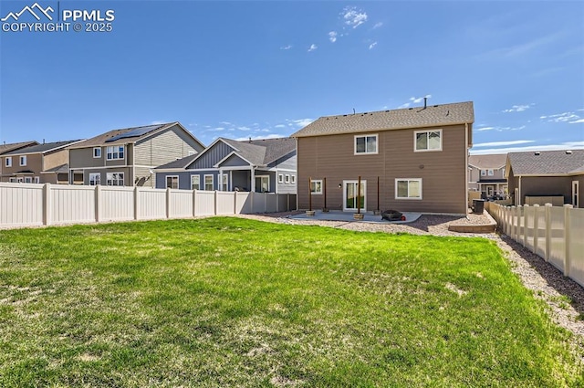8094 Misty Moon Dr, Colorado Springs, CO 80924 - rear view of house featuring a patio, a fenced backyard, a yard, and a residential view
