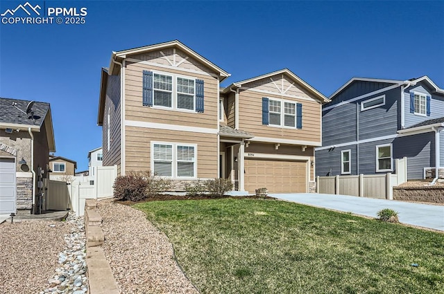 8094 Misty Moon Dr, Colorado Springs, CO 80924 - view of front of house with fence, an attached garage, driveway, and a front yard