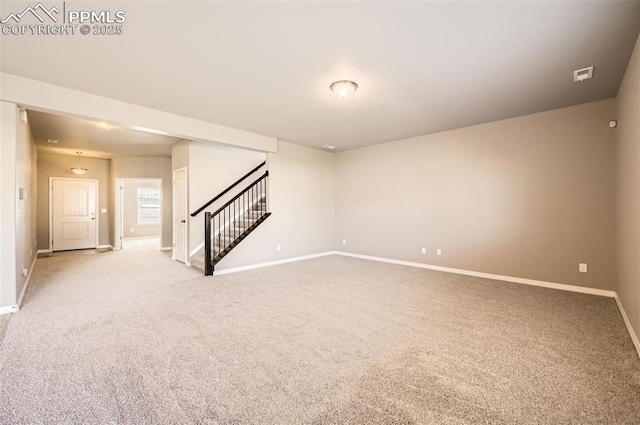8094 Misty Moon Dr, Colorado Springs, CO 80924 - empty room featuring stairway, baseboards, and light carpet