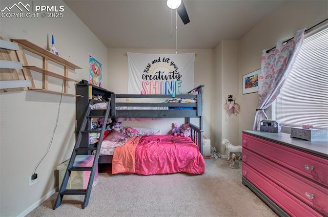 bedroom with carpet floors, baseboards, and a ceiling fan