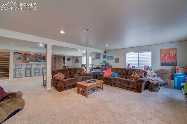 living room with carpet floors, a bar, recessed lighting, and visible vents
